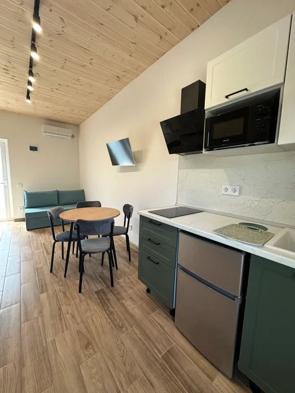 Студия в двухэтажном коттедже