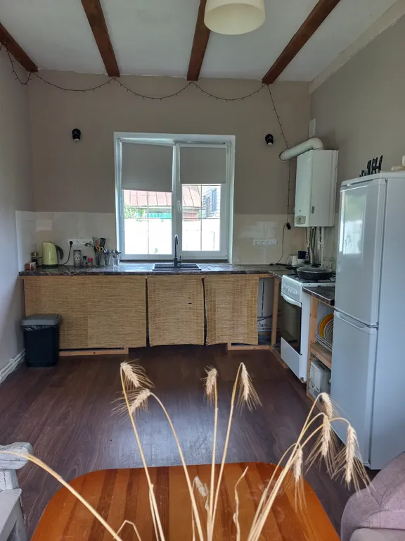 Частный дом в деревне в 15 километрах от центра города