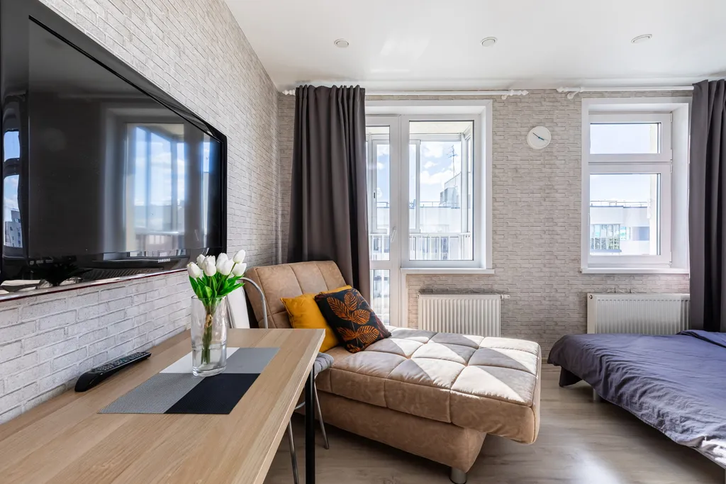 Уютная студия с шикарным видом на город