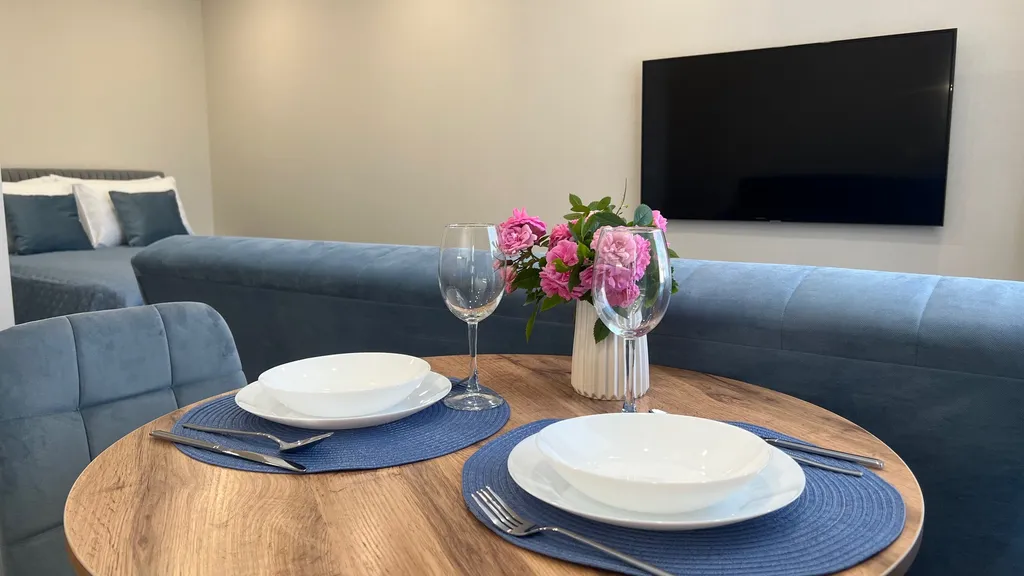 Апартамент у часовой башни и дома гильдии