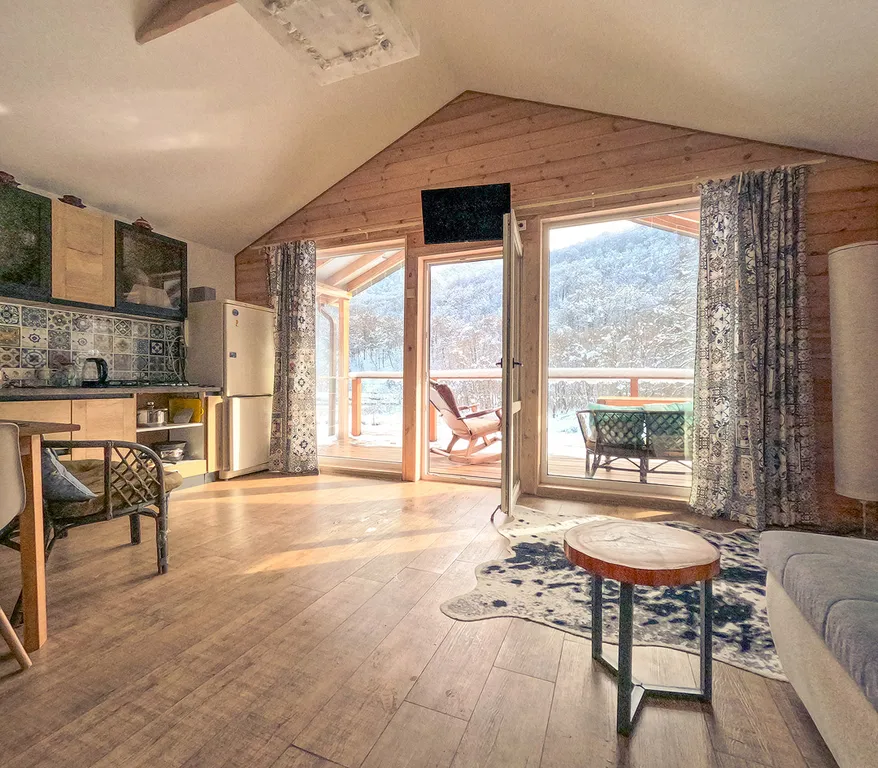 Коттедж Коттедж "Буковель" с терассой и видом на горы. — Архыз