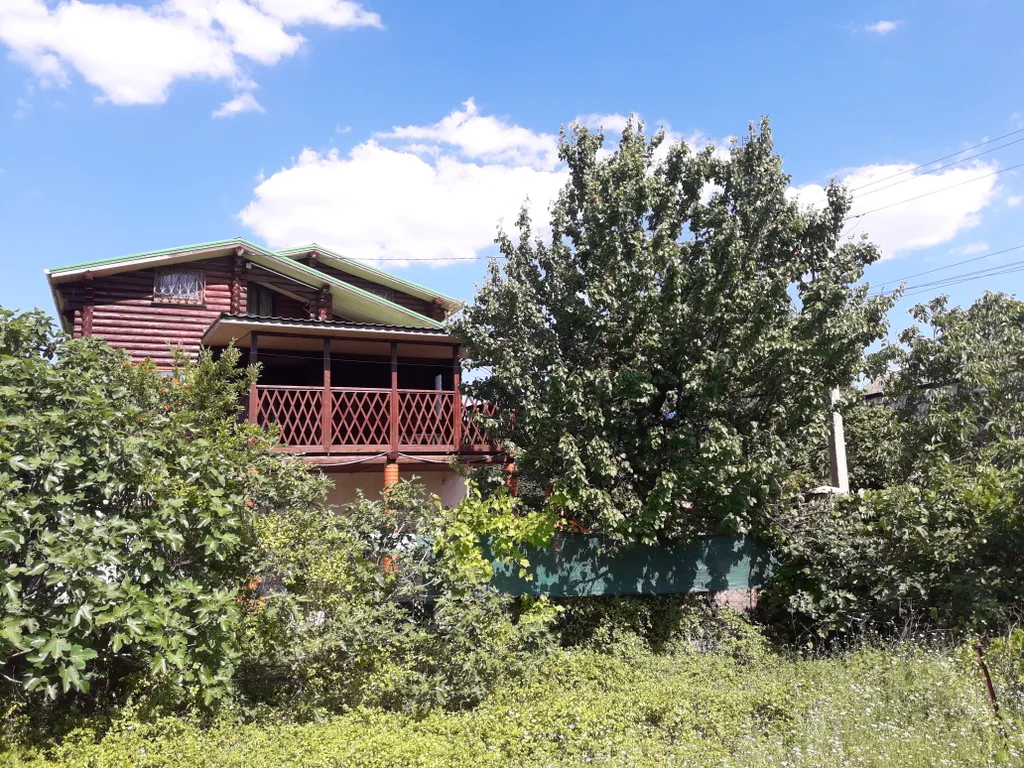 Дом из бруса с беседкой