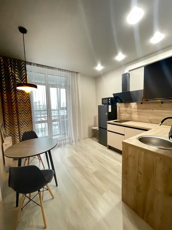 Панорамная квартира на верхнем этаже с видом на город