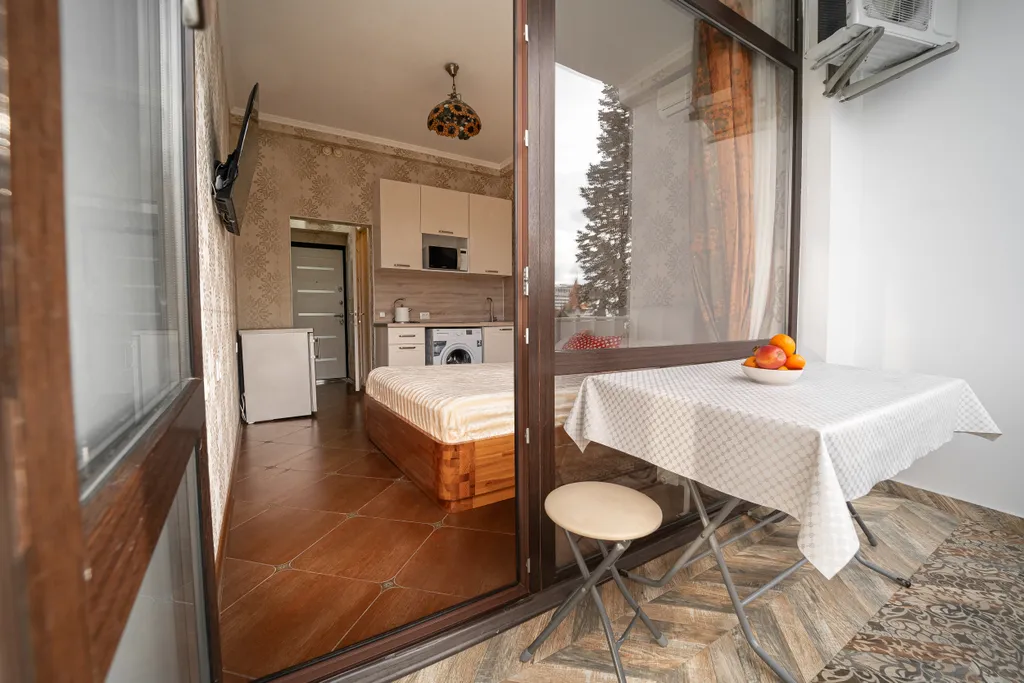 Квартира Очень теплый апартамент с открытым балконом, кухней, парковкой — аренда посуточно в Сочи