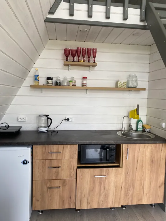 Треугольный дом