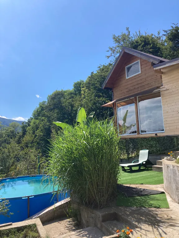 Шале в горах с бассеином и баней