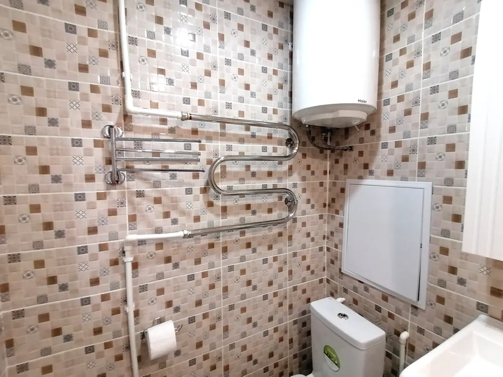 Уютная и тёплая квартира в центре города. Столовая расположена  в доме