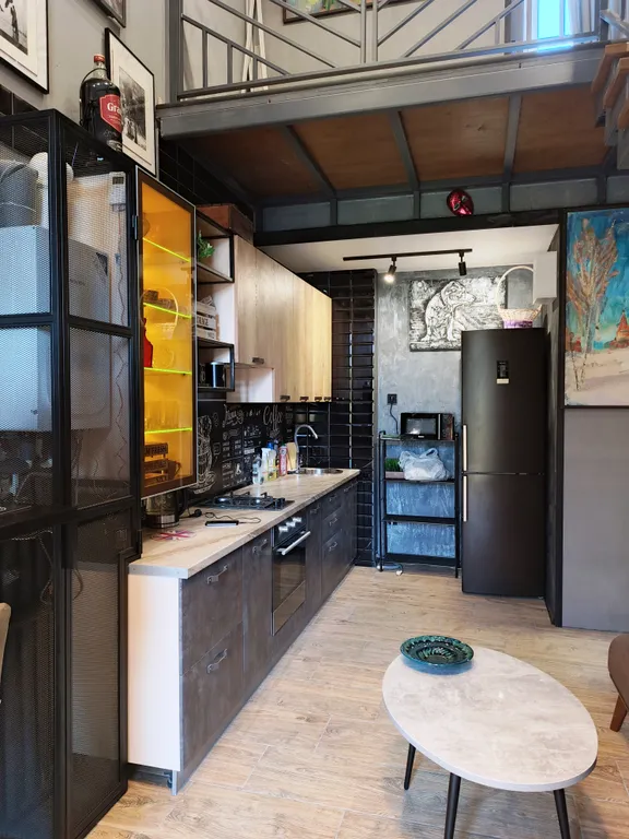 Атмосферная двухуровневая квартира с видом на Петропавловский парк