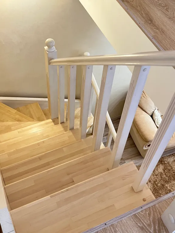 Светлая квартира с мансардой в центре города