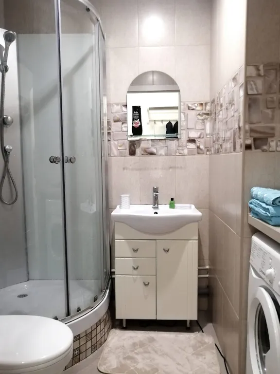 Уютная студия с большой кроватью