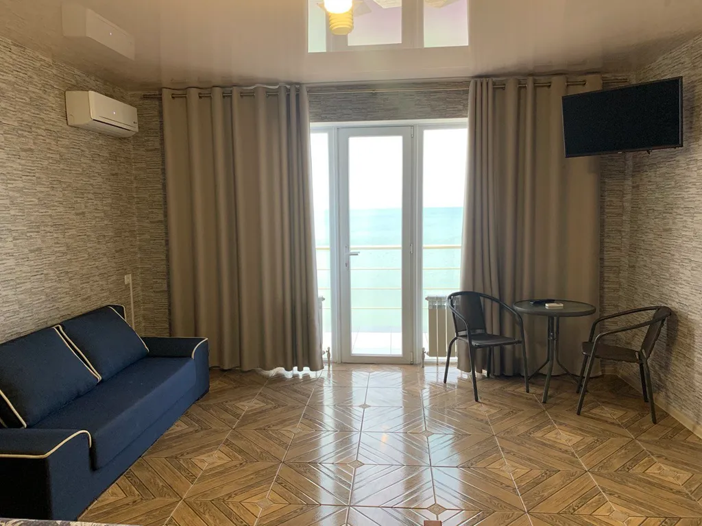 Четырехместный люкс с потрясающим видом на море