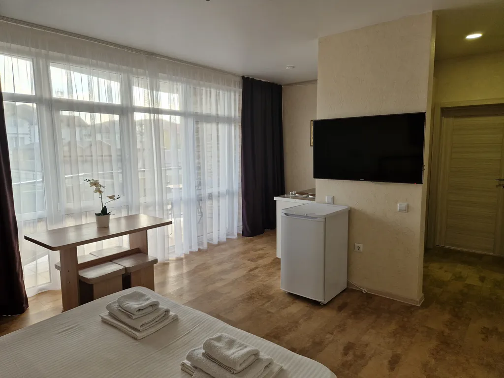 Комфортабельный номер с балконом-террасой и кухней