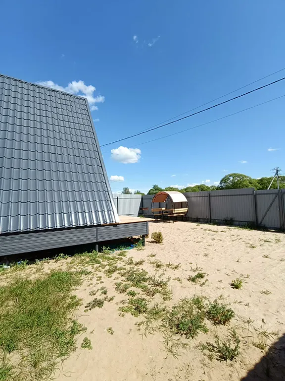 Уютный А-фрейм с чаном у озера