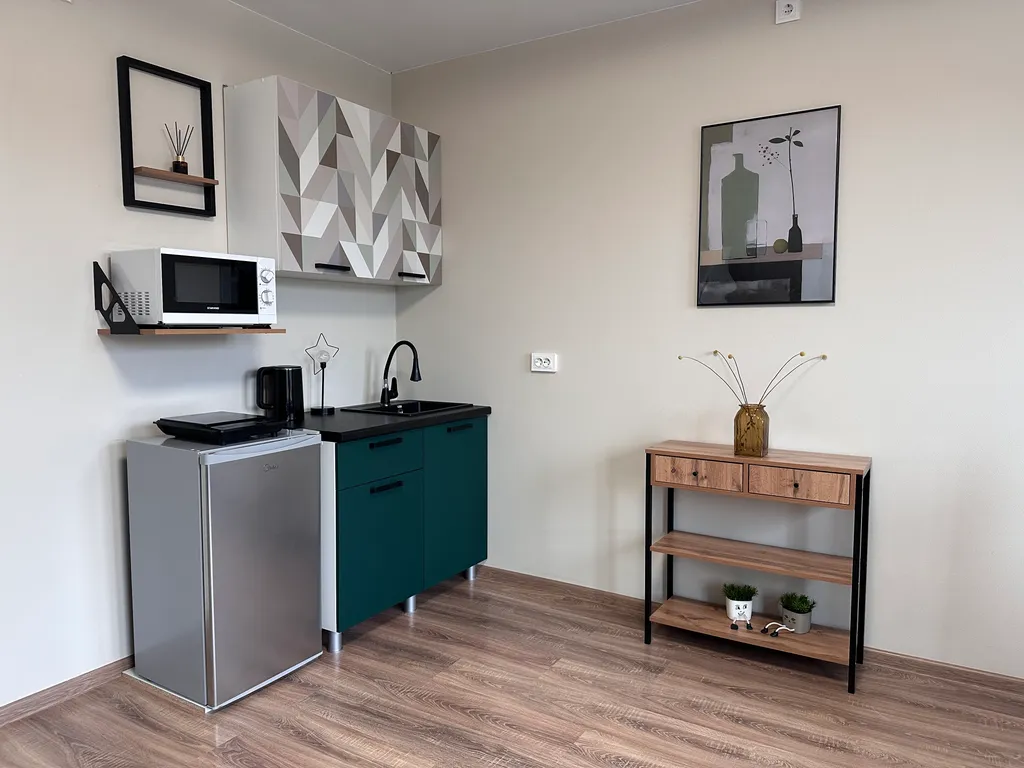 Студия с тремя раздельными кроватями