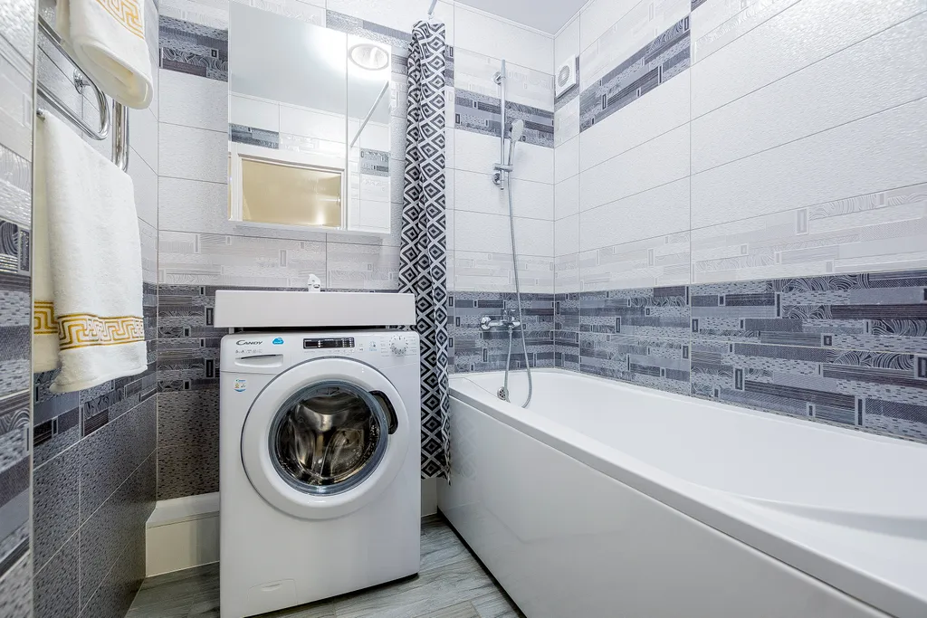 Уютная квартира в ЖК Паруса с подвесным креслом от Kravc Group