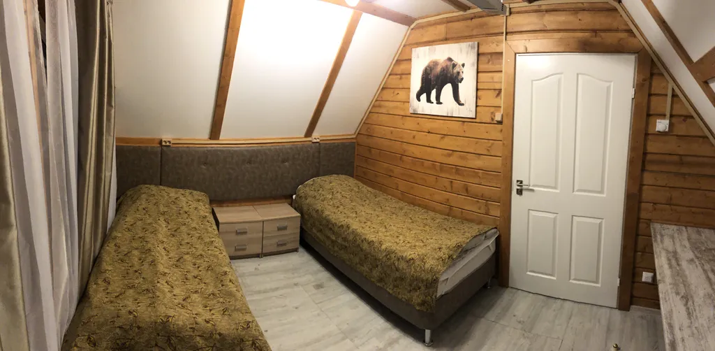 Люкс  двухэтажный с двумя спальнями и  терассой