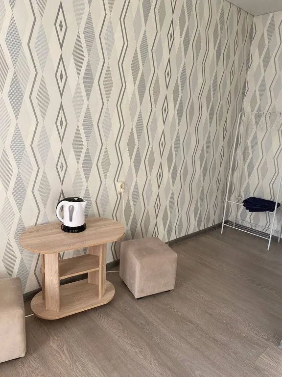 Уютная комната в центре города у моря.