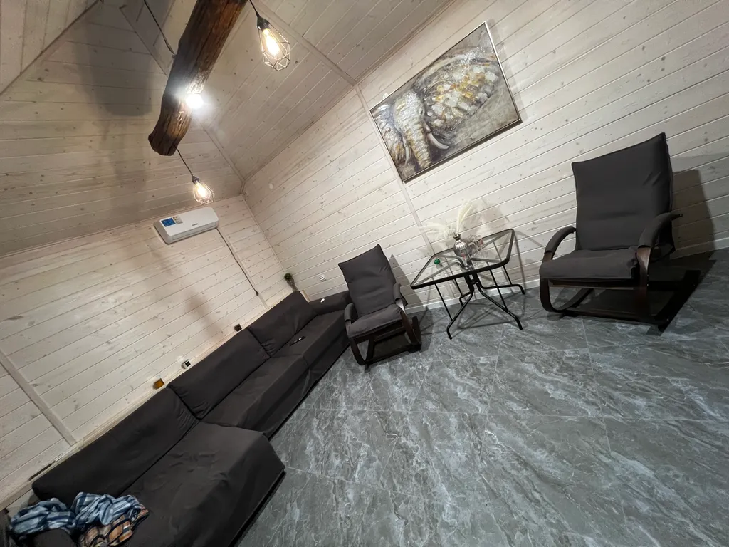 Домик в лесу у моря с верандой