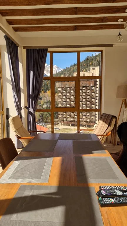 Апартаменты с восхитительными панорамными видами на вершины Домбая