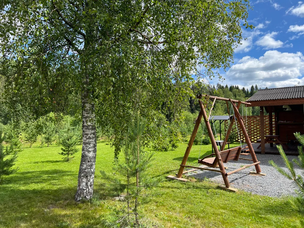 Коттедж с сауной и панорамным остеклением