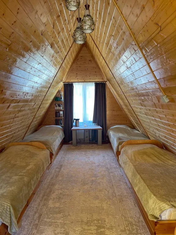 Уютная спальня на мансарде