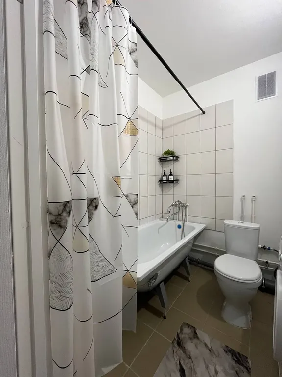 Уютная студия с видом на город