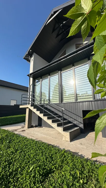 Уютный дом в черте города