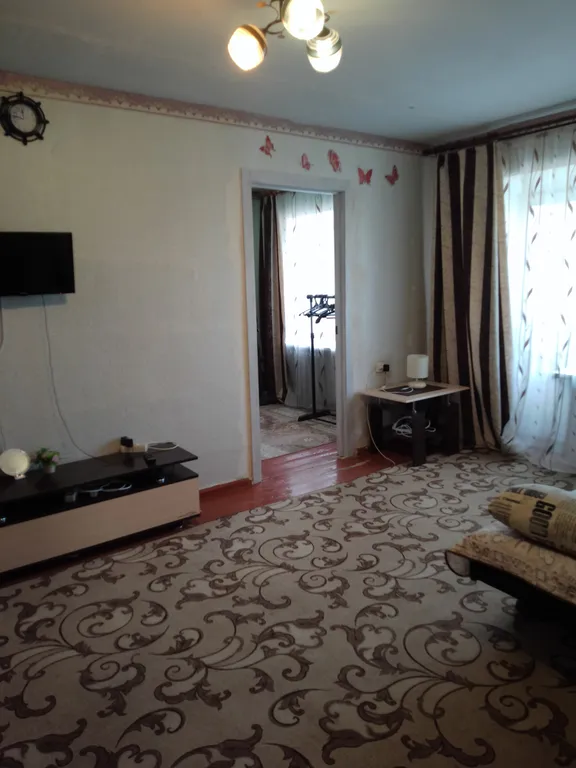 Уютная двухкомнатная квартира в центре города. Балкон застеклён