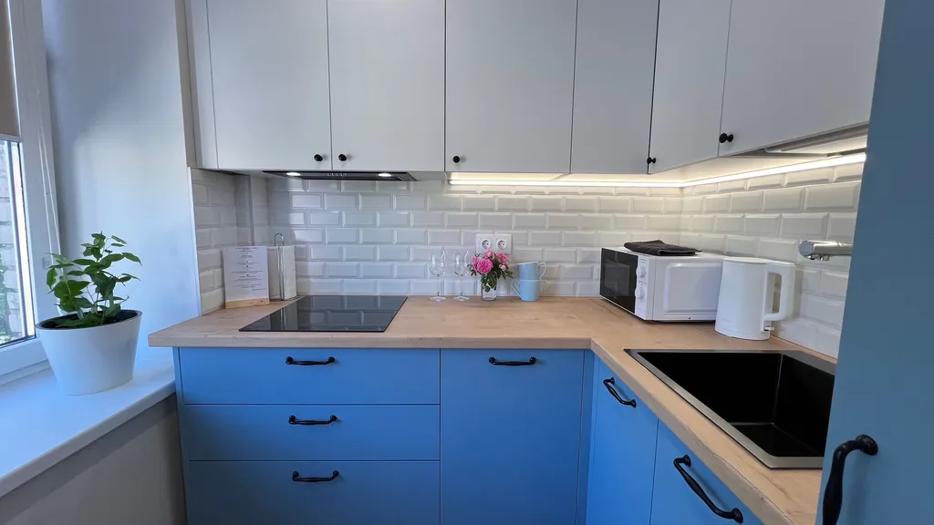 Апартамент у часовой башни и дома гильдии