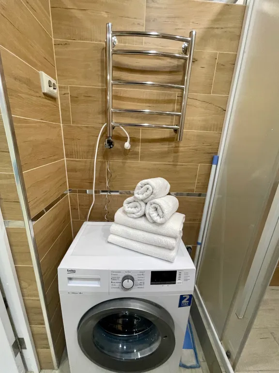 Светлая студия с панорамным окнами на горы напротив отеля Мариотт