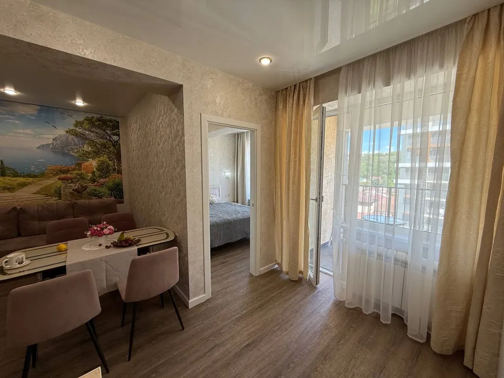 Просторная квартира рядом с видом на море, зона отдыха и бассейн