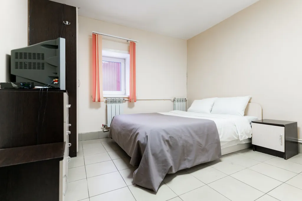 Квартира центре города на цокольном этаже с парковкой