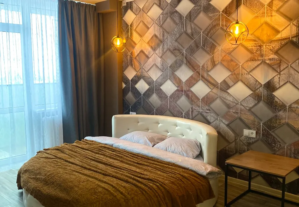 Пентхаус с видом на город. Круглая кровать+ диван