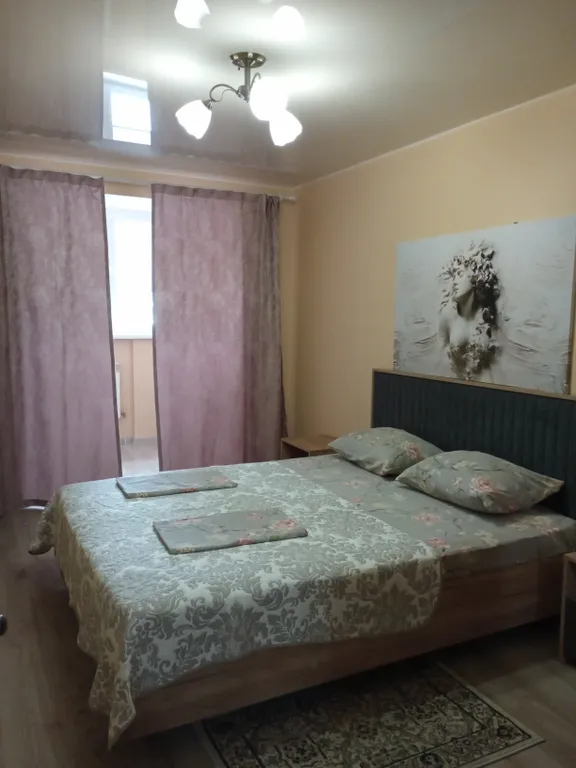 Квартира с видом на набережную и горы