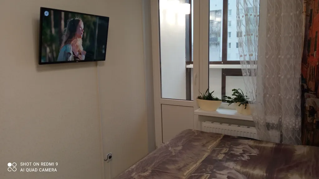 Уютная студия с видом на бульвар