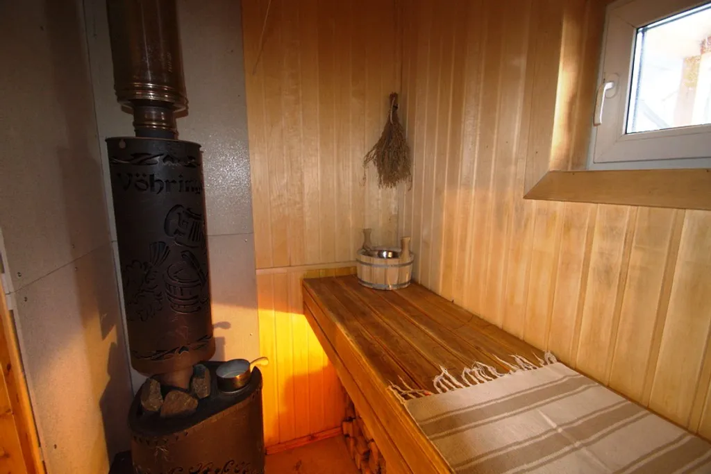 Стильный коттедж с баней и купелью