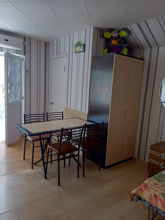 Коттедж Коттедж Уютный номер-студия со всеми удобствами на втором этаже с террасой — Ейск