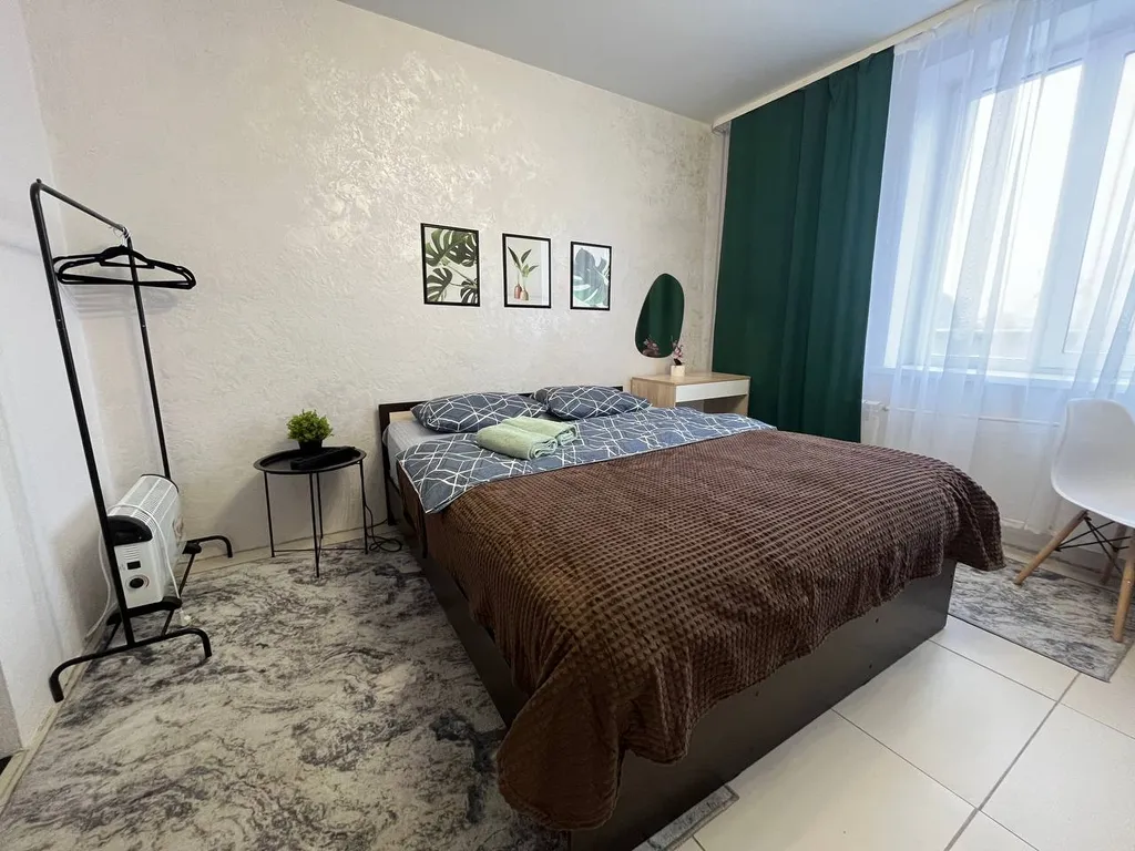 Уютные апартаменты около ТЦ Изумрудный город