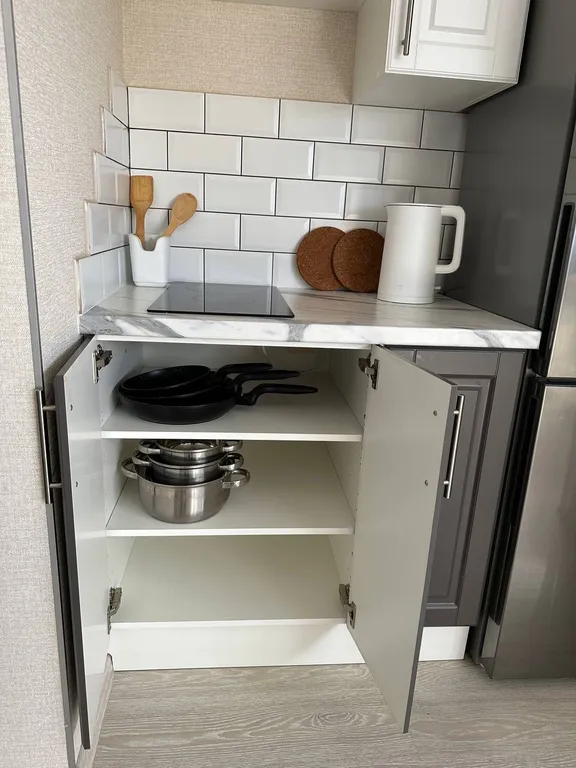 Уютная студия на высоте птичьего полёта