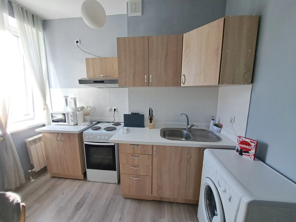 Светлая однушка с кроватью и смарт ТВ