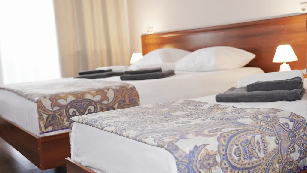 Семейный номер в отеле с бассейном, сауной и питанием