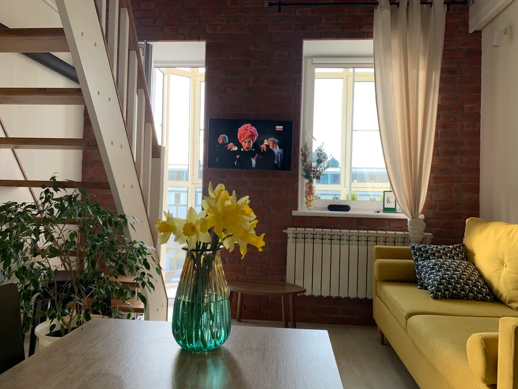 Двухуровневые апартаменты Снегурочка на набережной в центре города