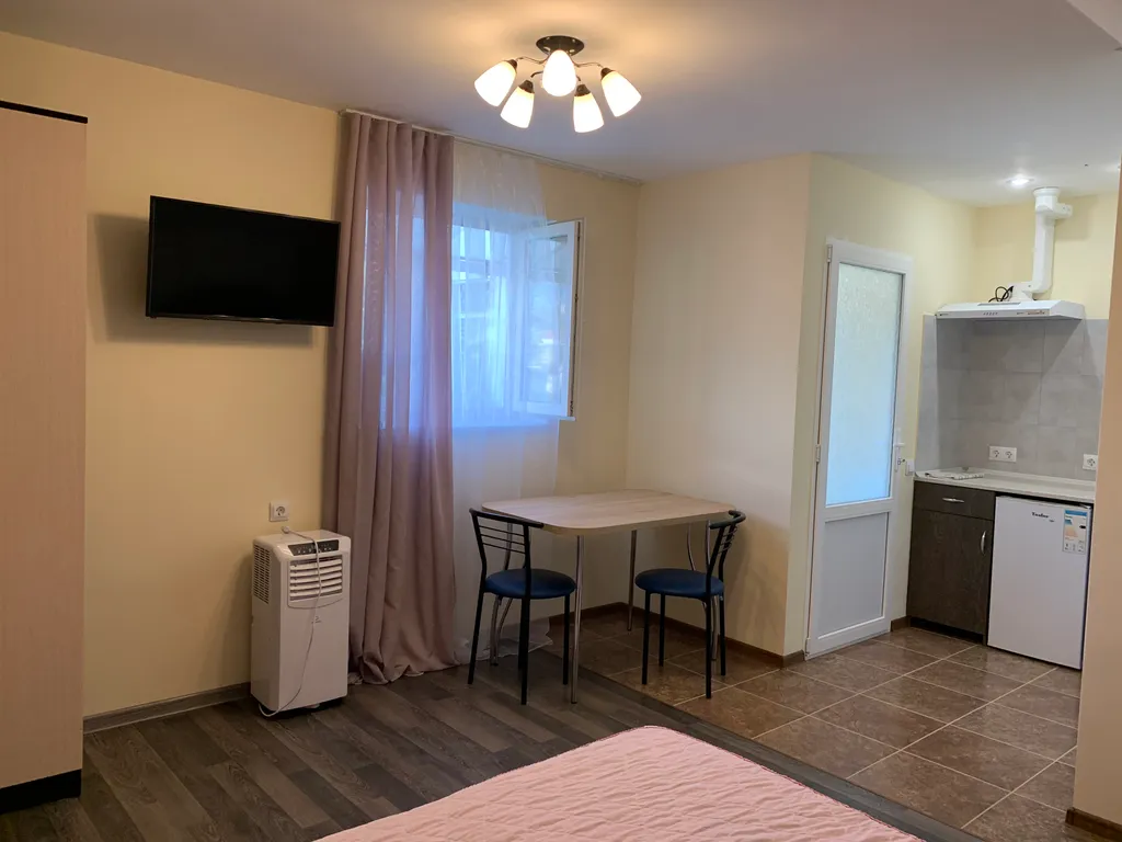 Квартира Уютная комната-студия с видом на сад — Севастополь