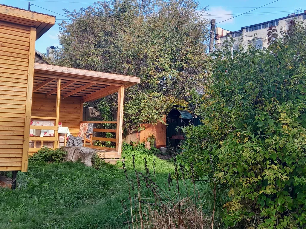 Домик из сосны в городе  С.