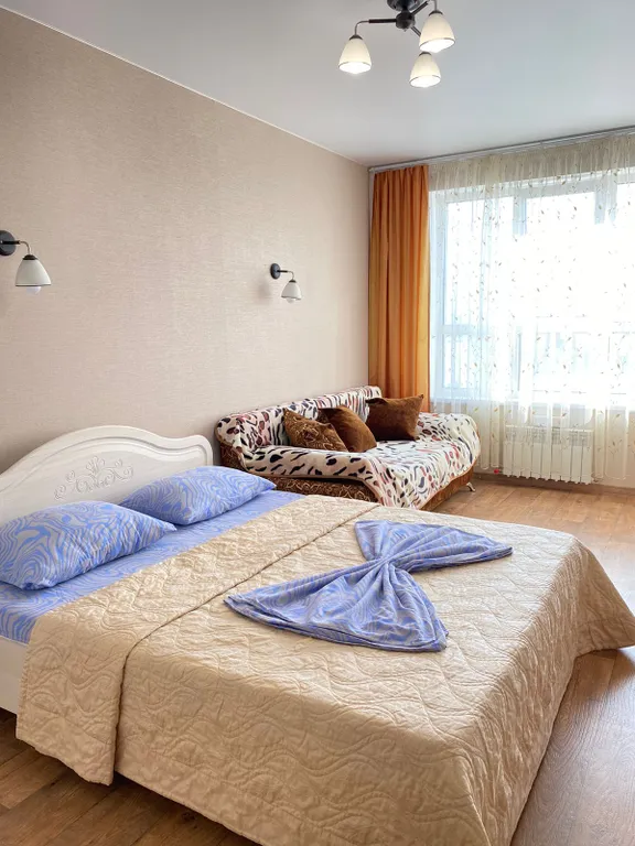 Уютная квартира с ортопедическим матрасом и панорамным балконом