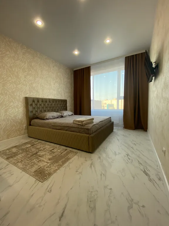 Квартира Уютная и чистая студия в центре города — аренда посуточно в Курган