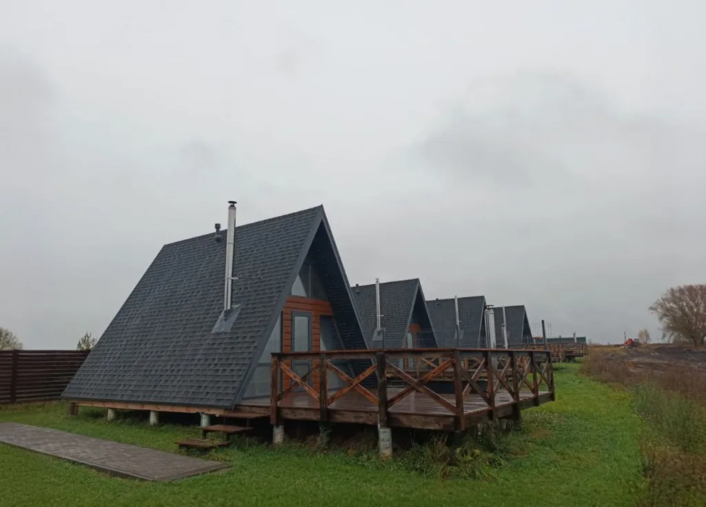 Дом в стиле A frame с чаном