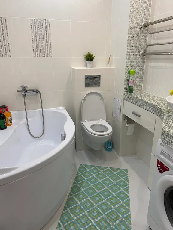 Уютная квартира с современным ремонтом в новом элитном доме