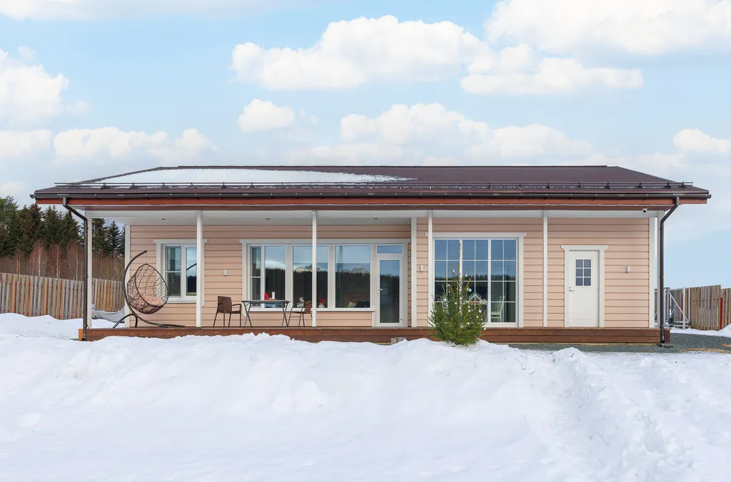 Коттедж Коттедж на берегу озера с видом на горнолыжный курорт и сауной внутри — Заозерный