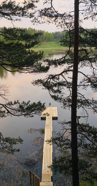 Дом-студия с панорамной стеной на залив Мусталанлахти